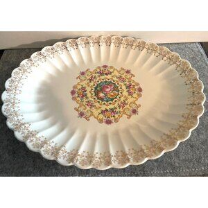 Vintage oval Plate by American Home Pattern Melody Warranted 22-k Accented  11 i